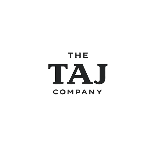 Black text 'The TAJ Company' on a white background